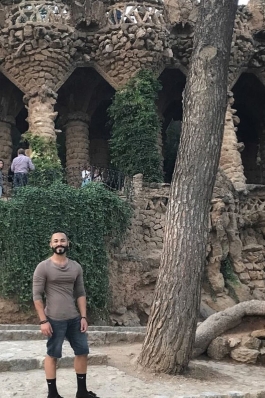 Juan Vargas next to a tree