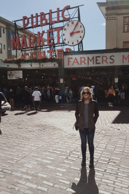 A photo of Shay outside Pike Place in Seattle.