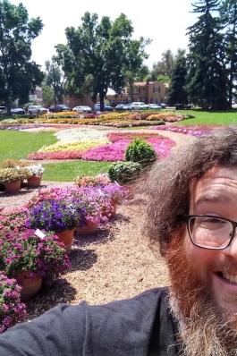 Adam Storm in a flowery garden