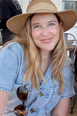 Allison Jones wearing a straw hat