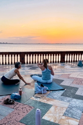 Allison Jones on the marble-floored waterfront veranda at the Ca’ d’Zan at Ringling Museum