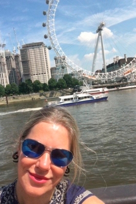 close-up portrait of a Angie Austin in front of the London eye