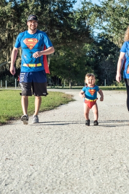 Lauryn Peterson and family wearing Superman outfits for Halloween in Sarasota