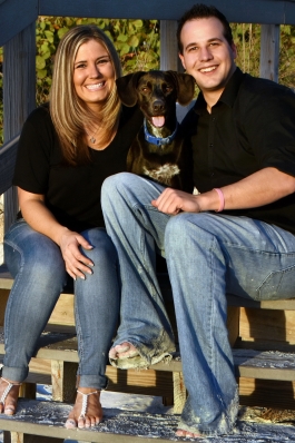 Lauryn Peterson sits on the beach access stairs on a boardwalk on St. Petersburg Beach