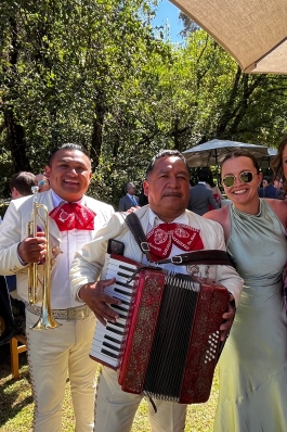A photo of Victoria with a Mariachi band
