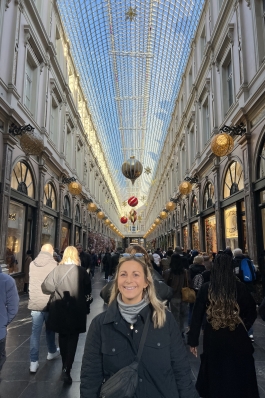 Lexie surrounded by historical buildings in Brussels.